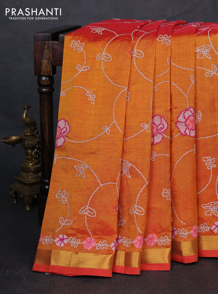 Silk cotton saree sunset orange with allover convent embroidery weaves and zari woven border
