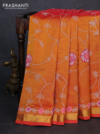 Silk cotton saree sunset orange with allover convent embroidery weaves and zari woven border