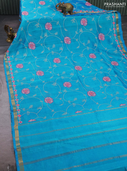 Silk cotton saree teal blue with allover convent embroidery weaves and zari woven border