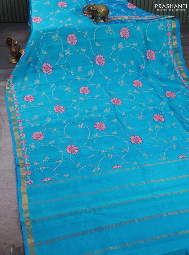 Silk cotton saree teal blue with allover convent embroidery weaves and zari woven border