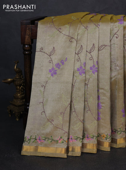 Silk cotton saree elaichi green with allover convent embroidery weaves and zari woven border
