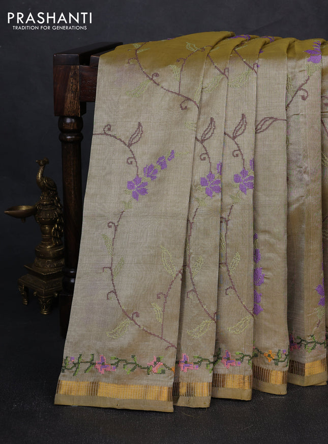 Silk cotton saree elaichi green with allover convent embroidery weaves and zari woven border