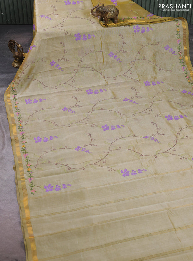 Silk cotton saree elaichi green with allover convent embroidery weaves and zari woven border