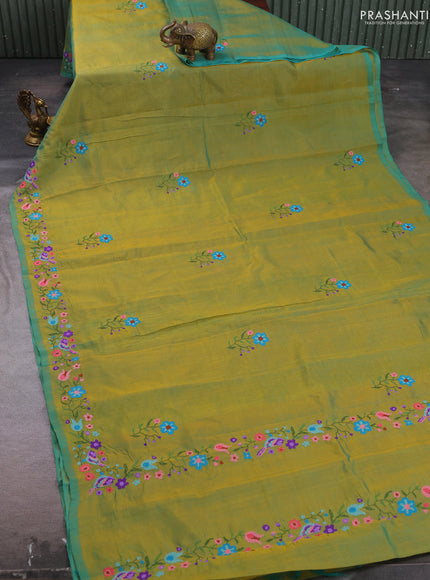 Silk cotton saree dual shade of greenish yellow with floral convent embroidery buttas and embroidery border