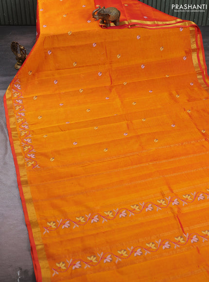 Silk cotton saree sunset orange with allover convent embroidery buttas and zari woven border