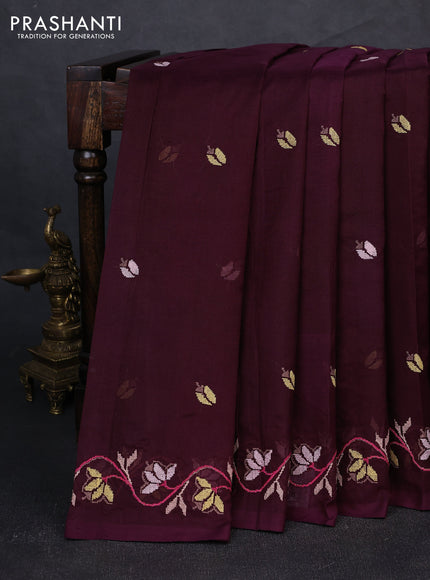 Silk cotton saree deep wine shade with floral convent embroidery buttas and embroidery border