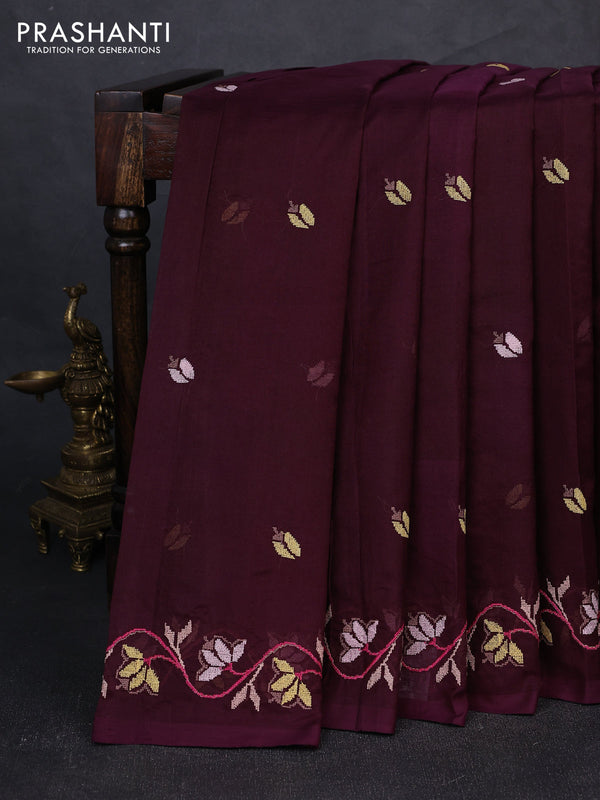 Silk cotton saree deep wine shade with floral convent embroidery buttas and embroidery border