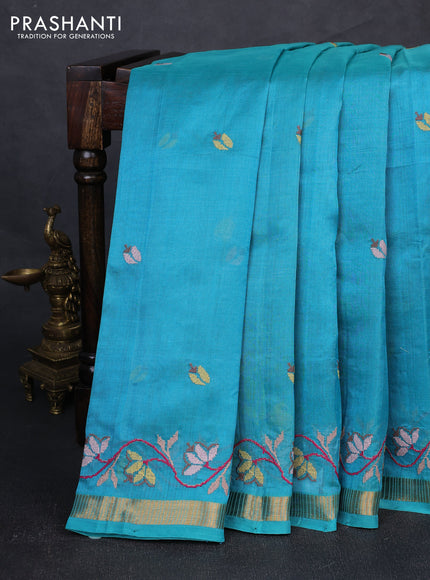 Silk cotton saree teal blue with floral convent embroidery buttas and zari woven border