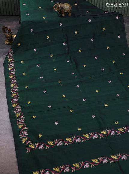 Silk cotton saree bottle green with floral convent embroidery buttas and zari woven border