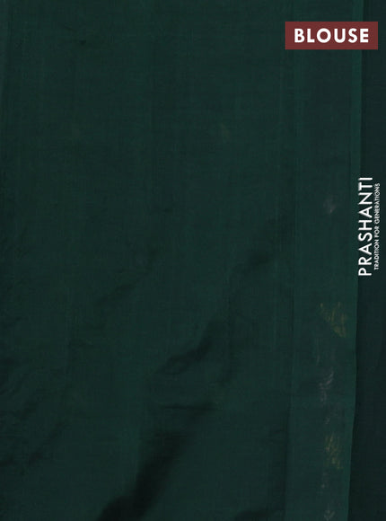 Silk cotton saree bottle green with floral convent embroidery buttas and zari woven border