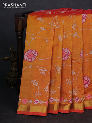 Silk cotton saree sunset orange with floral convent embroidery weaves and zari woven border