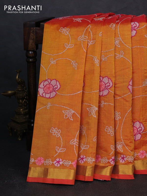 Silk cotton saree sunset orange with floral convent embroidery weaves and zari woven border