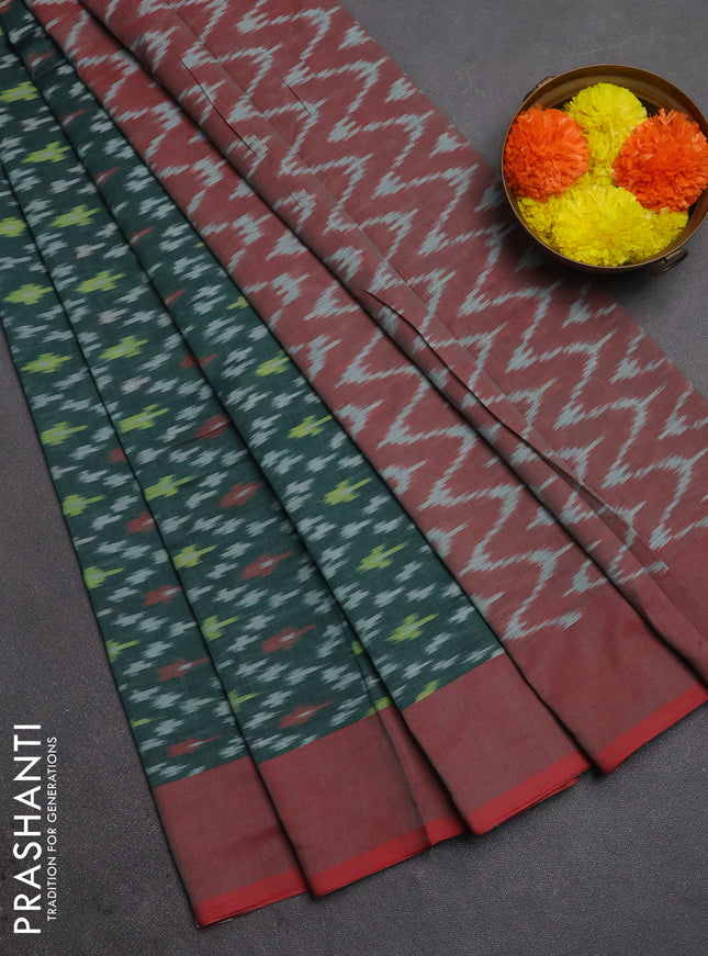 Ikat cotton saree green and red with allover ikat weaves and rettapet ikat woven border