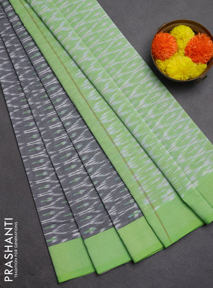 Ikat cotton saree grey and light green with allover ikat weaves and simple border