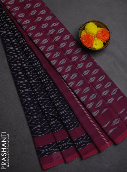 Ikat cotton saree black and magenta pink with allover ikat weaves and rettapet ikat woven border