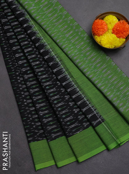 Ikat cotton saree black and green with allover ikat weaves and simple border