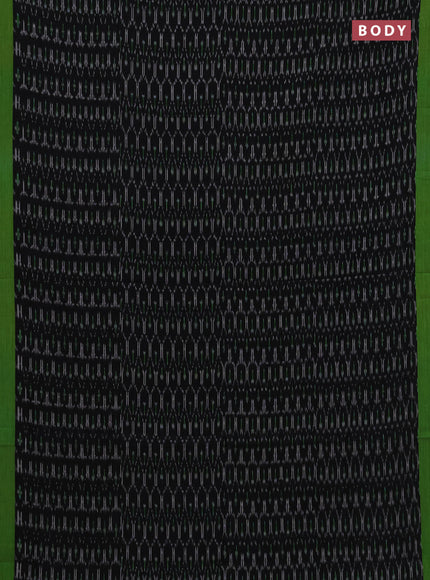 Ikat cotton saree black and green with allover ikat weaves and simple border