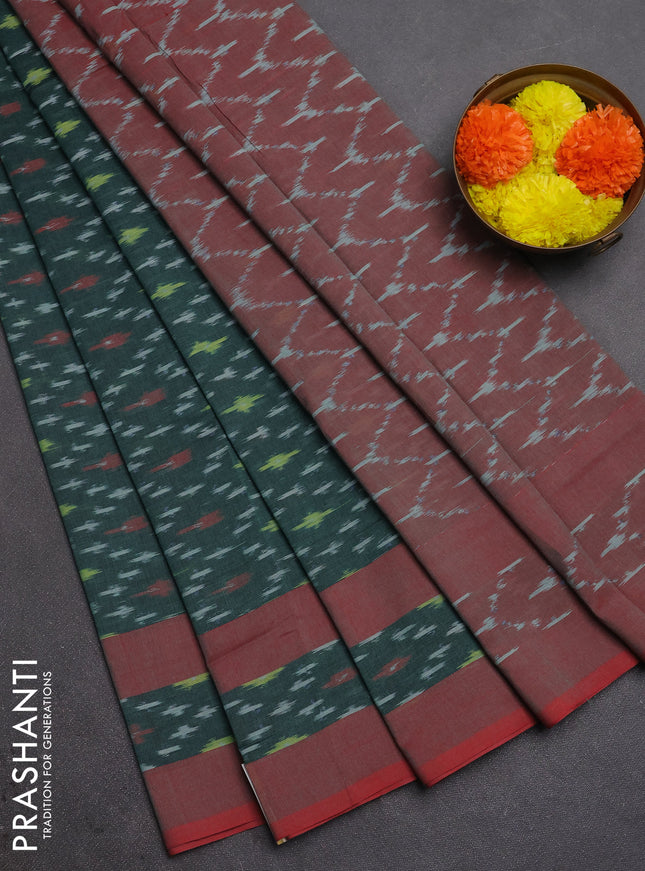 Ikat cotton saree bottle green and red with allover ikat weaves and rettapet ikat border