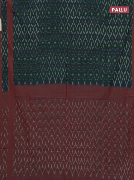 Ikat cotton saree bottle green and red with allover ikat weaves and rettapet ikat border