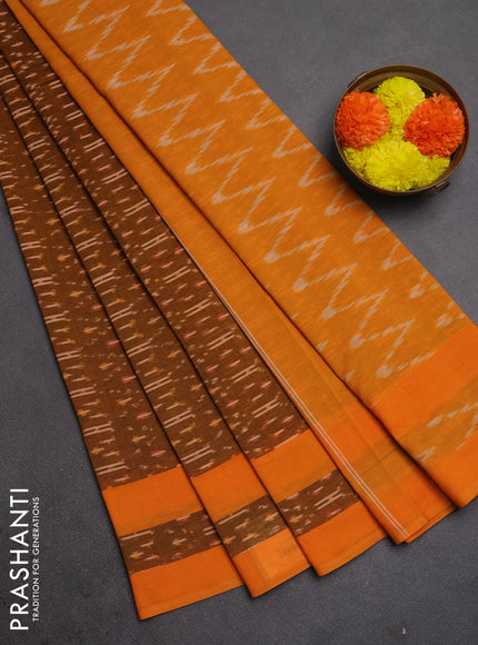 Ikat cotton saree dark mustard and mustard yellow with allover ikat weaves and rettapet ikat border