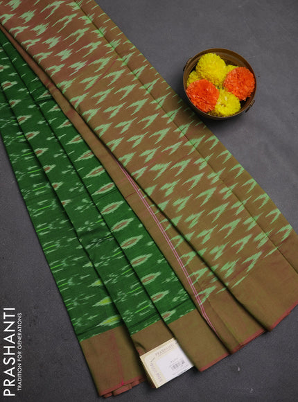 Ikat cotton saree green and pink with allover ikat weaves and simple border