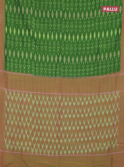 Ikat cotton saree green and pink with allover ikat weaves and simple border
