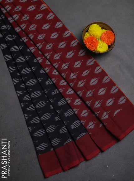 Ikat cotton saree black and maroon with allover ikat woven butta weaves and simple border