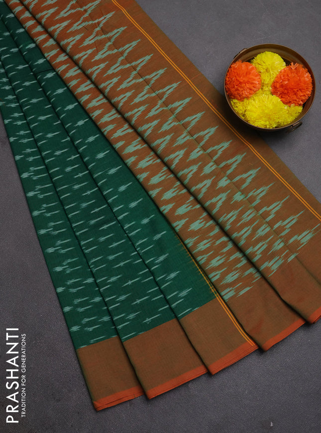 Ikat cotton saree green and red with allover ikat woven butta weaves and simple border