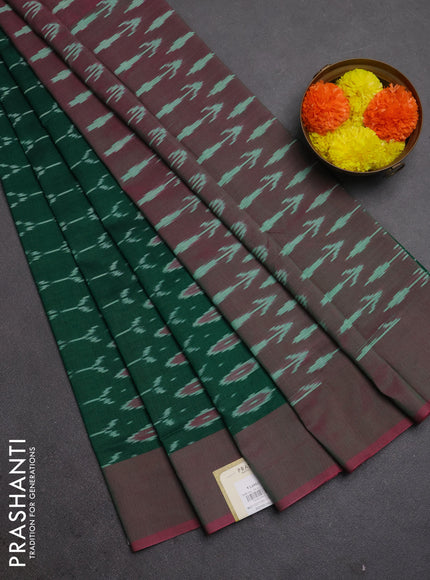 Ikat cotton saree green and pink with allover ikat woven butta weaves and simple border