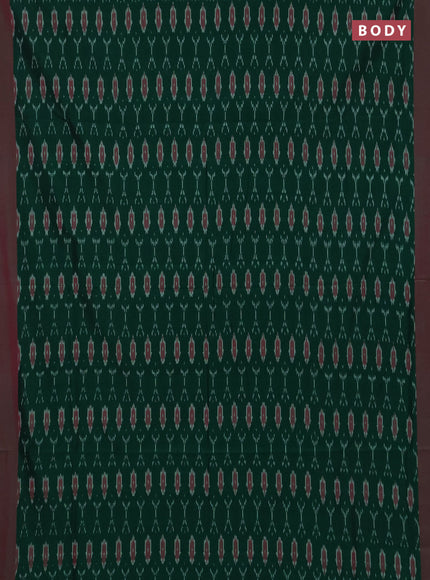 Ikat cotton saree green and pink with allover ikat woven butta weaves and simple border