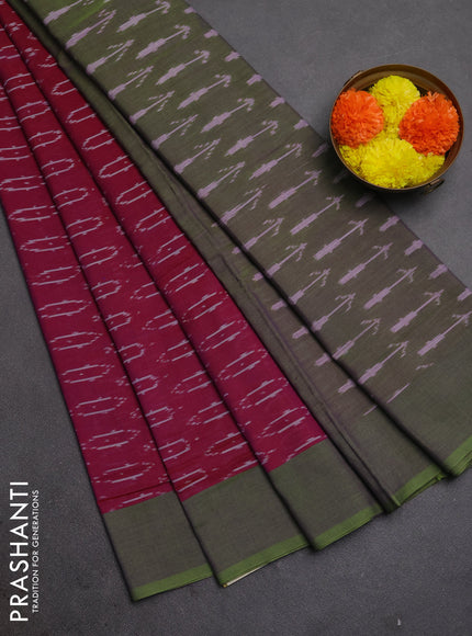 Ikat cotton saree magenta pink and light green with allover ikat woven butta weaves and simple border