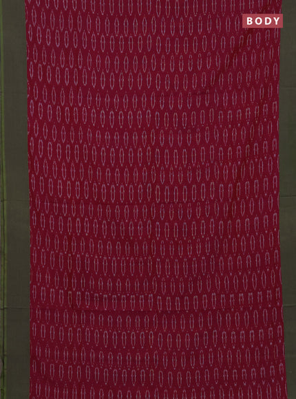 Ikat cotton saree magenta pink and light green with allover ikat woven butta weaves and simple border