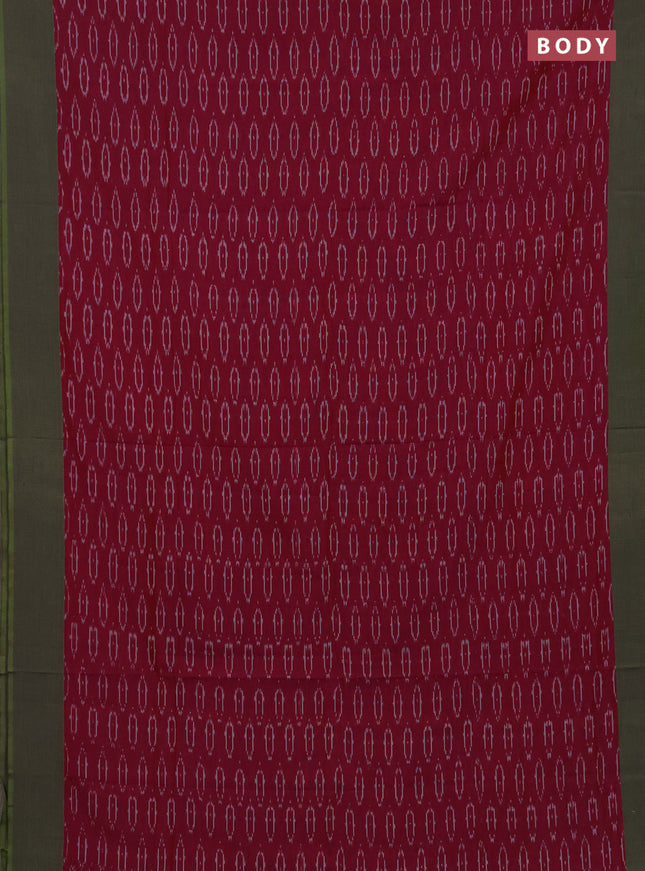 Ikat cotton saree magenta pink and light green with allover ikat woven butta weaves and simple border