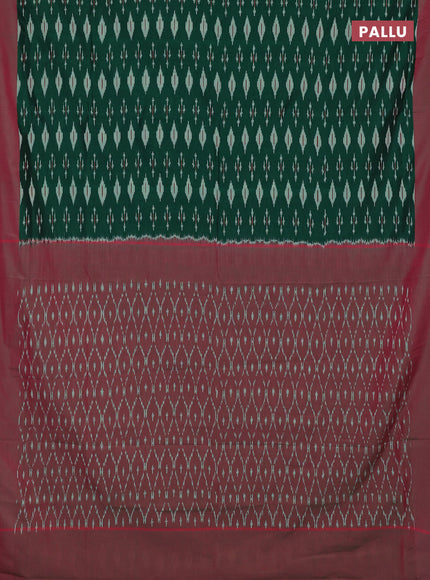 Ikat cotton saree bottle green and pink with allover ikat woven butta weaves and simple border