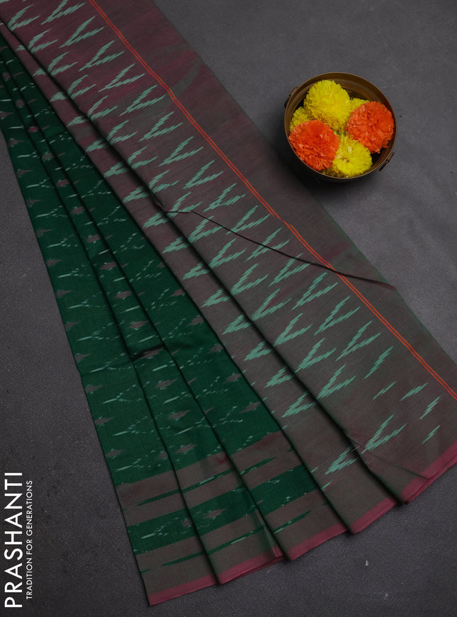 Ikat cotton saree green and pink with allover ikat woven buttas and rettapet ikat woven border