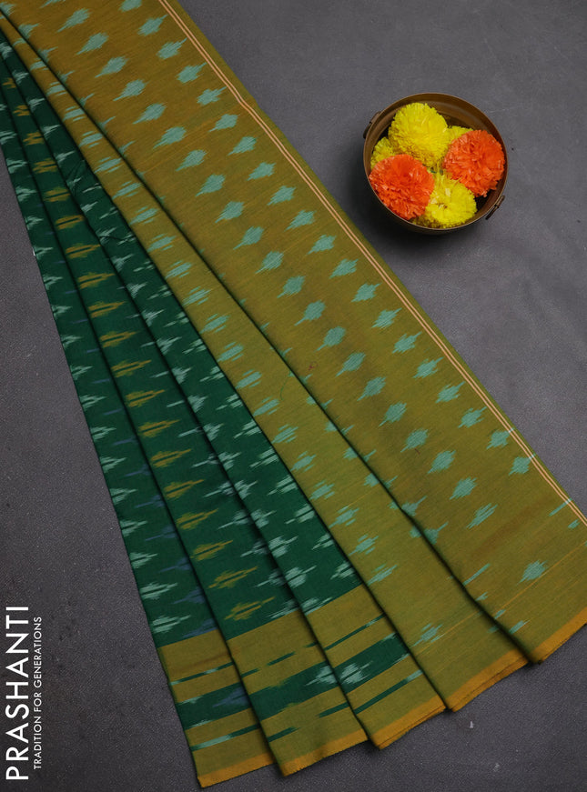 Ikat cotton saree green and lime green with allover ikat weaves and rettapet ikat woven border