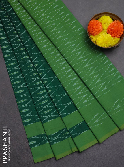 Ikat cotton saree bottle green and green with allover ikat weaves and rettapet ikat border
