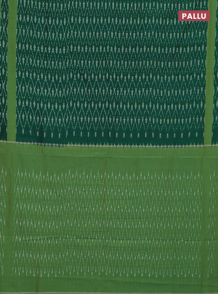 Ikat cotton saree bottle green and green with allover ikat weaves and rettapet ikat border