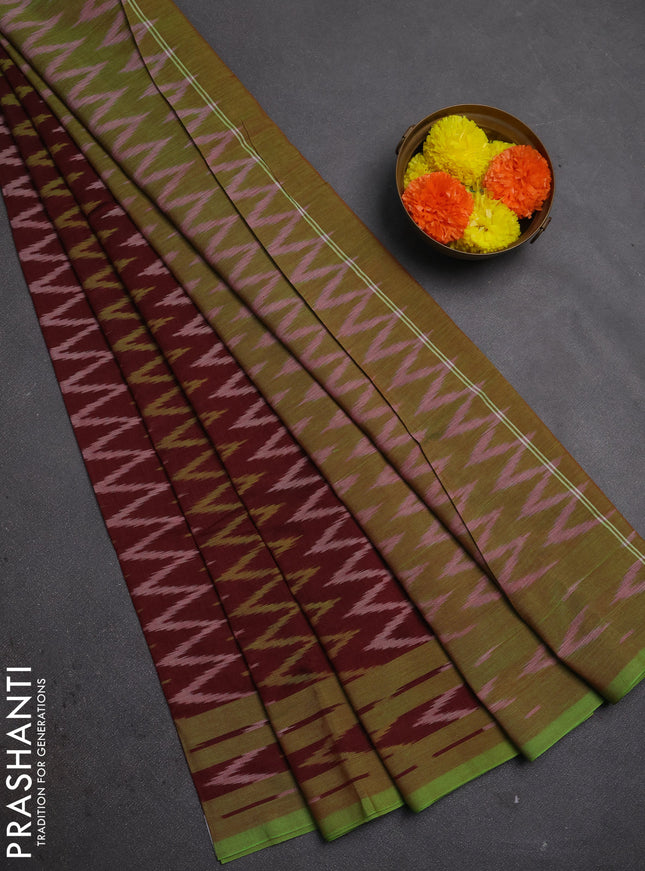 Ikat cotton saree deep maroon and light green with allover ikat zigzag weaves and rettapet ikat border