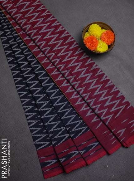 Ikat cotton saree navy blue and magenta pink with allover ikat zigzag weaves and rettapet ikat border