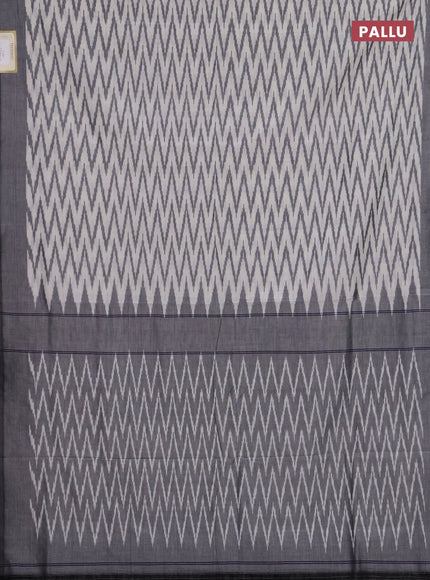 Ikat cotton saree off white and black with allover ikat zigzag weaves and simple border