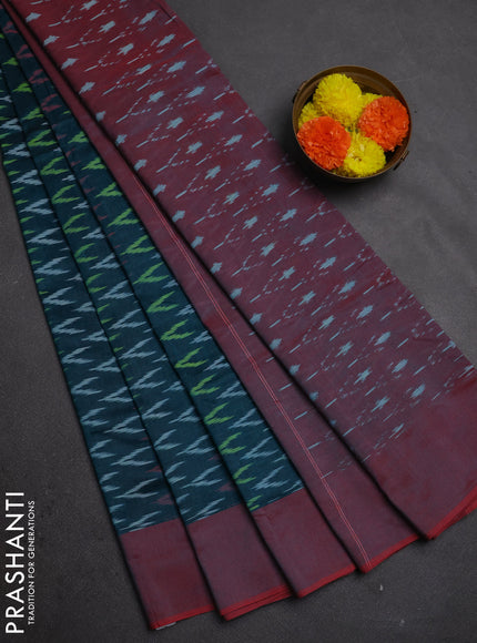 Ikat cotton saree peacock green and red with allover ikat weaves and simple border