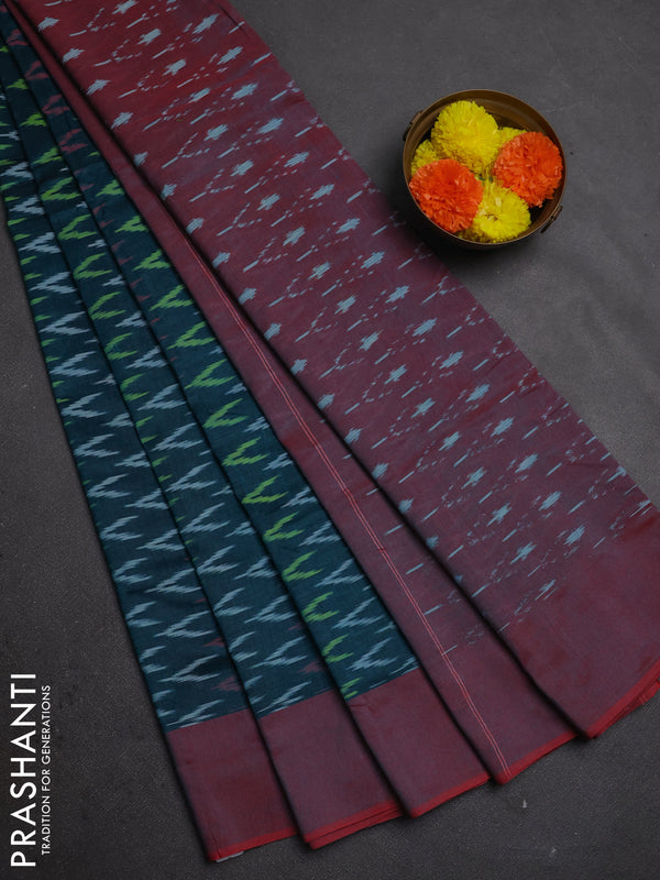 Ikat cotton saree peacock green and red with allover ikat weaves and simple border