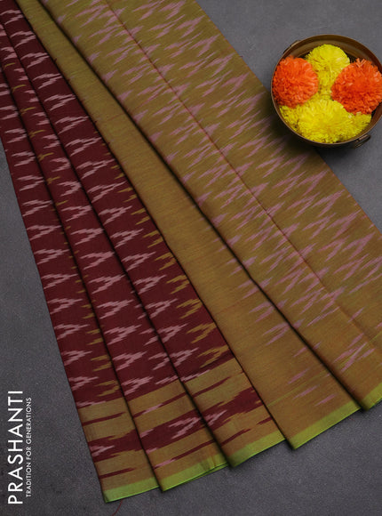 Ikat cotton saree deep maroon and light green with allover ikat woven butta weaves and rettapet ikat woven border