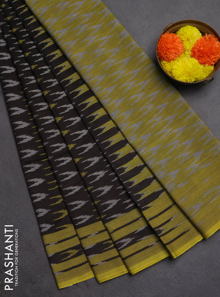Ikat cotton saree black and lime green with allover ikat woven butta weaves and rettapet ikat woven border