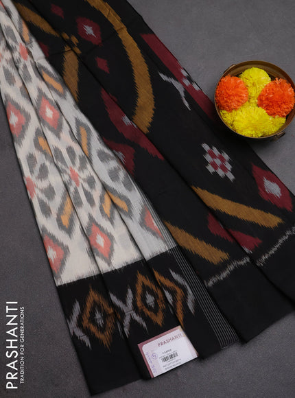 Ikat cotton saree off white and black with allover ikat weaves and ikat woven border