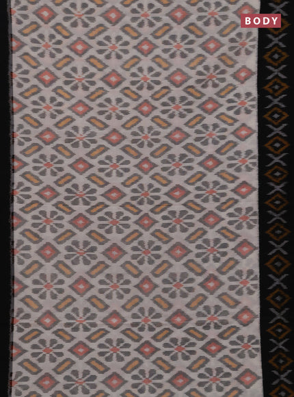 Ikat cotton saree off white and black with allover ikat weaves and ikat woven border