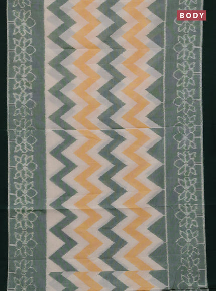 Ikat cotton saree off white and bottle green with allover zigzag ikat weaves and simple border