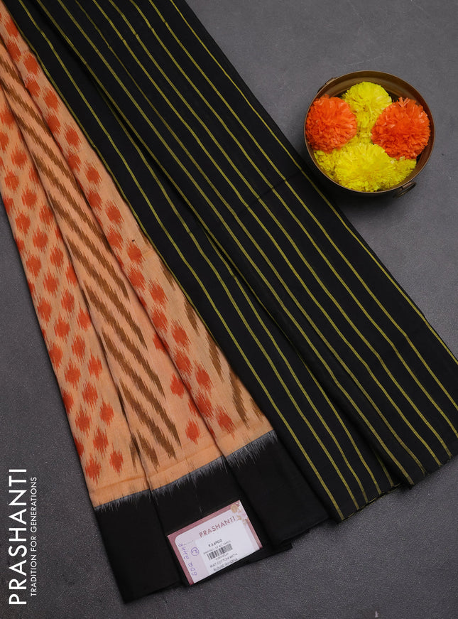 Ikat cotton saree peach shade and black with allover ikat weaves and simple border