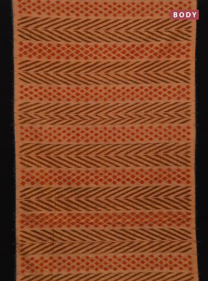 Ikat cotton saree peach shade and black with allover ikat weaves and simple border